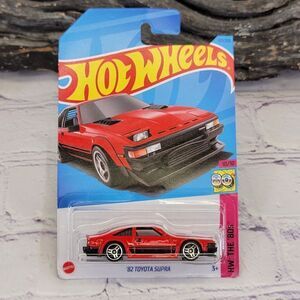 NIB Hot Wheels	'82 Toyota Supra -	HW: The '80s - HKG87	- Red - 167/250 - 10/10